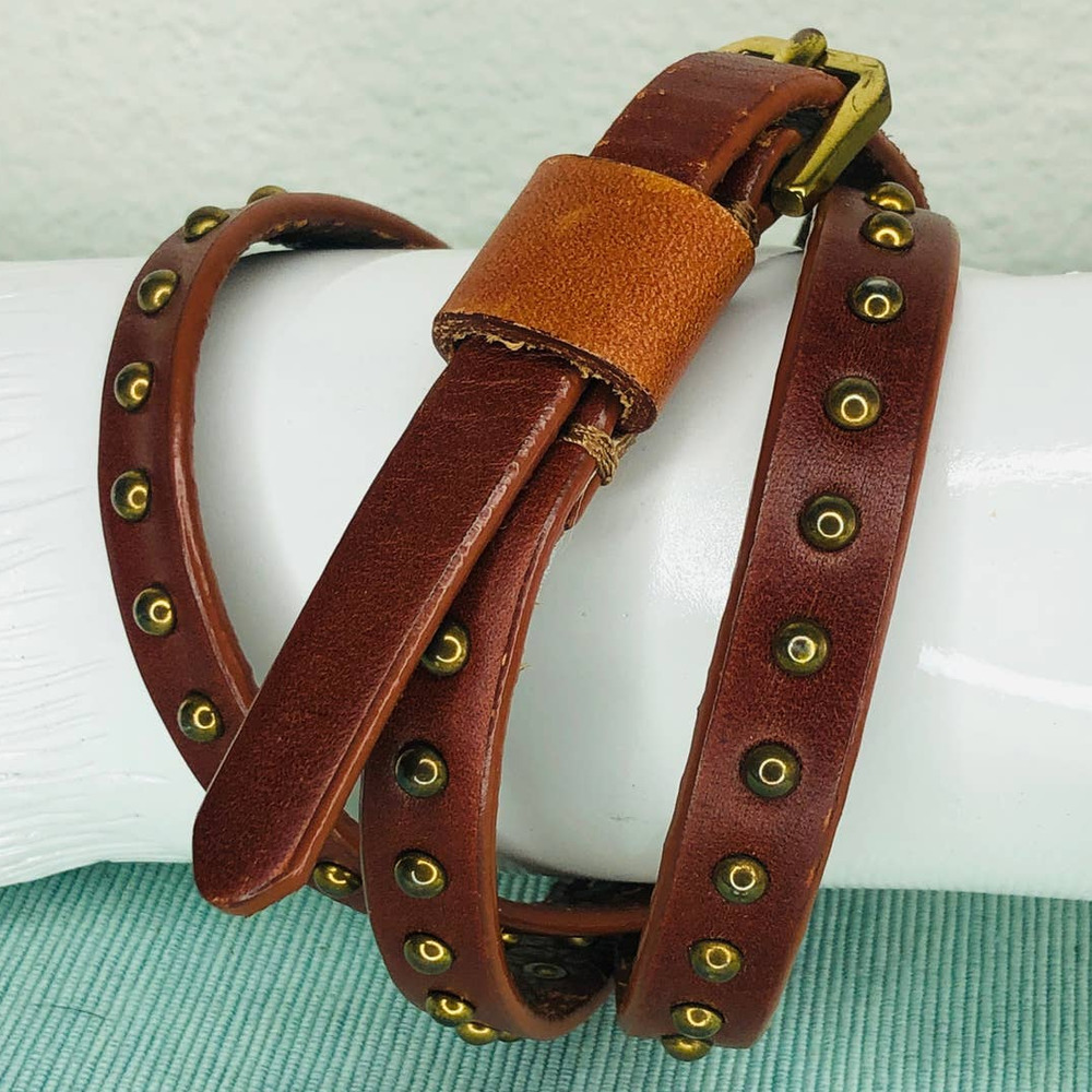 Slim brown Women's Belt in bronze tone with studded accent